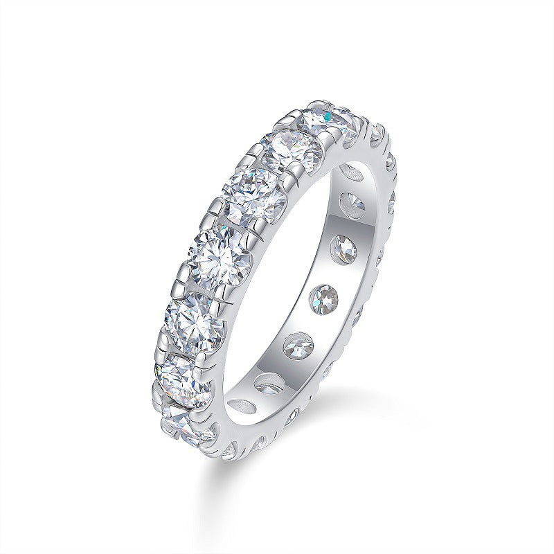 Celeste eternity moissanite band ring in 18K gold plated sterling silver, vertical angled view