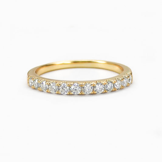 Aeris micro pavé moissanite band in 18K gold plated sterling silver on white background