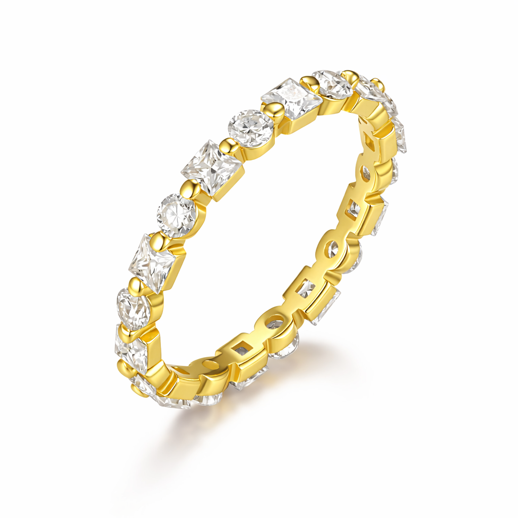 Gold tone alternating moissanite eternity band on clean white background