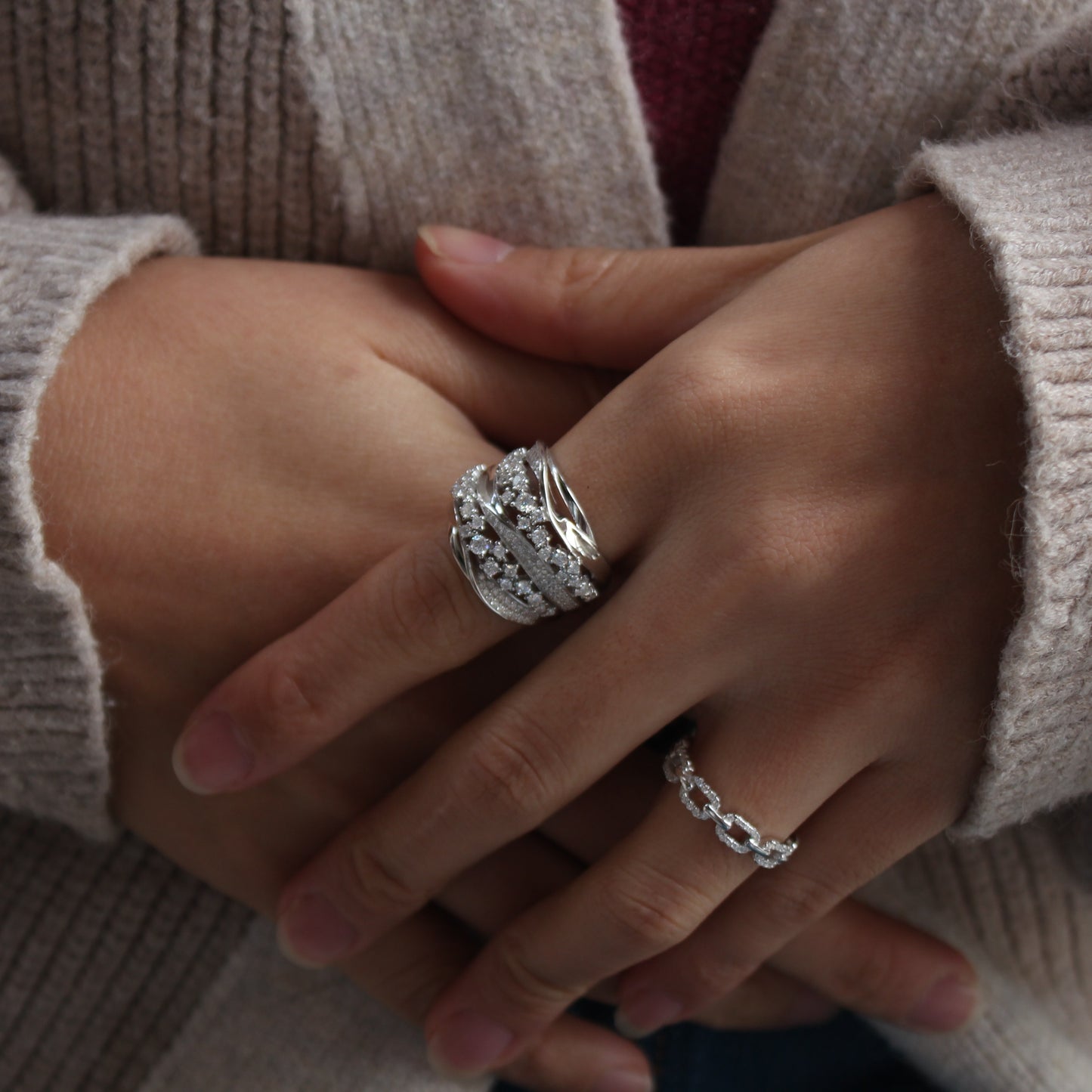 Lifestyle hand photo featuring Aurora pavé moissanite band ring
