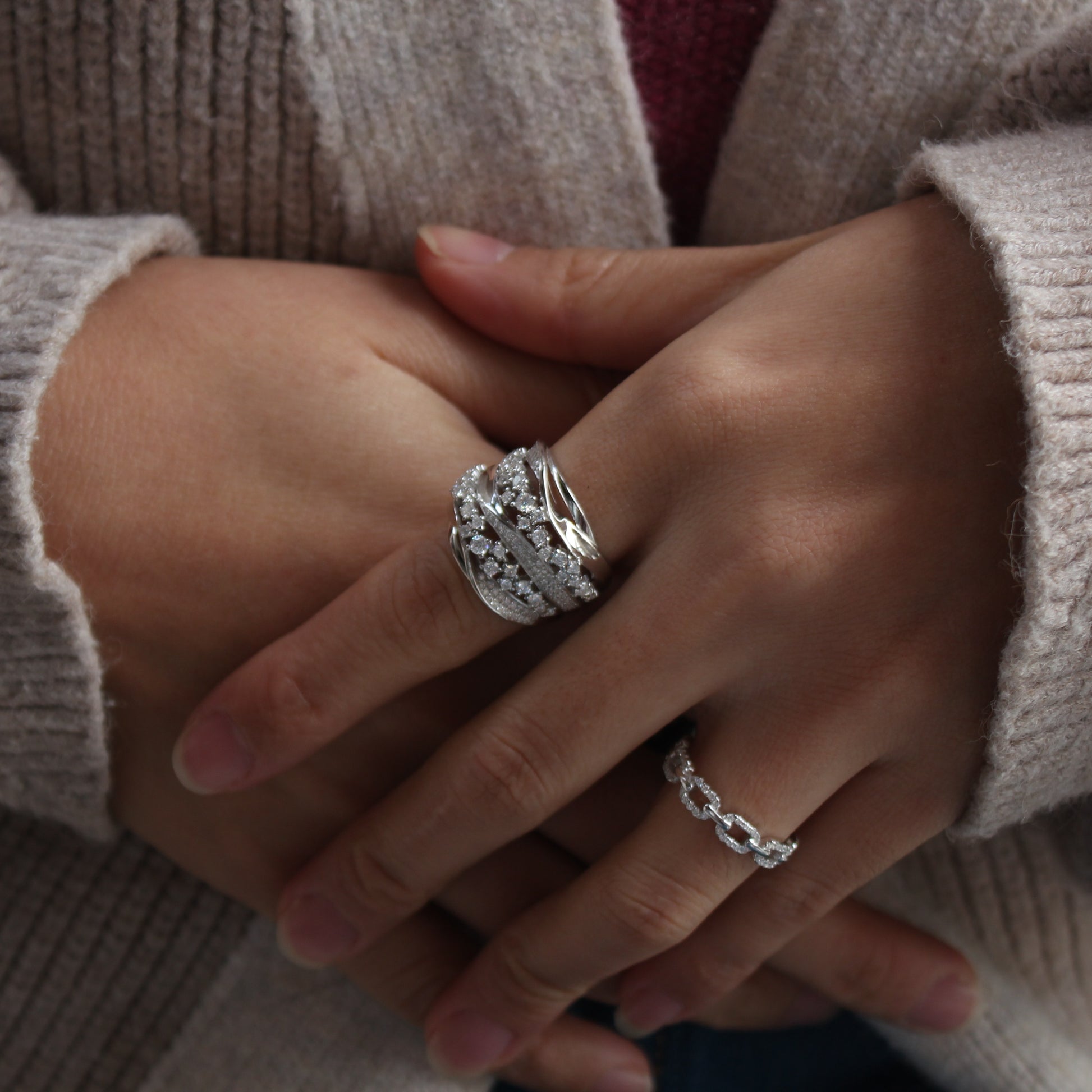 Lifestyle hand photo featuring Aurora pavé moissanite band ring