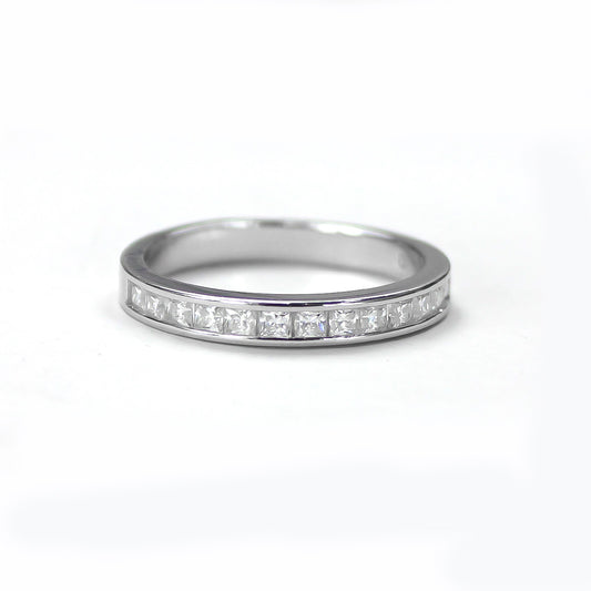 Baguette channel moissanite ring in 18K gold plated sterling silver, front view on white background