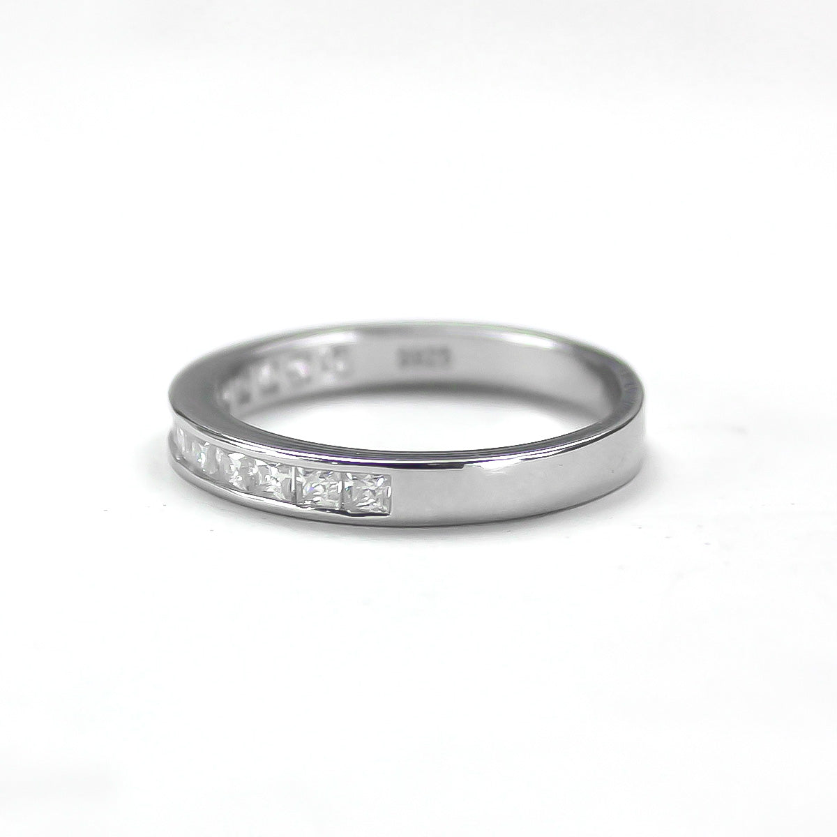 Side profile of baguette channel moissanite ring in 18K gold plated sterling silver