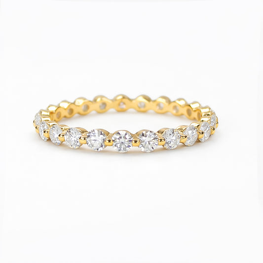 Celeste pavé eternity moissanite band ring in 18K gold plated sterling silver on white background
