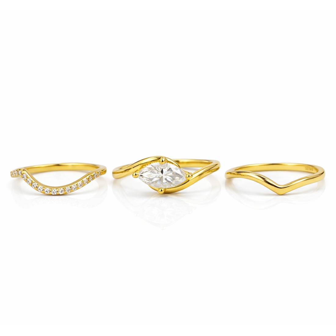 Curved moissanite ring set stacked, angled view in gold tone