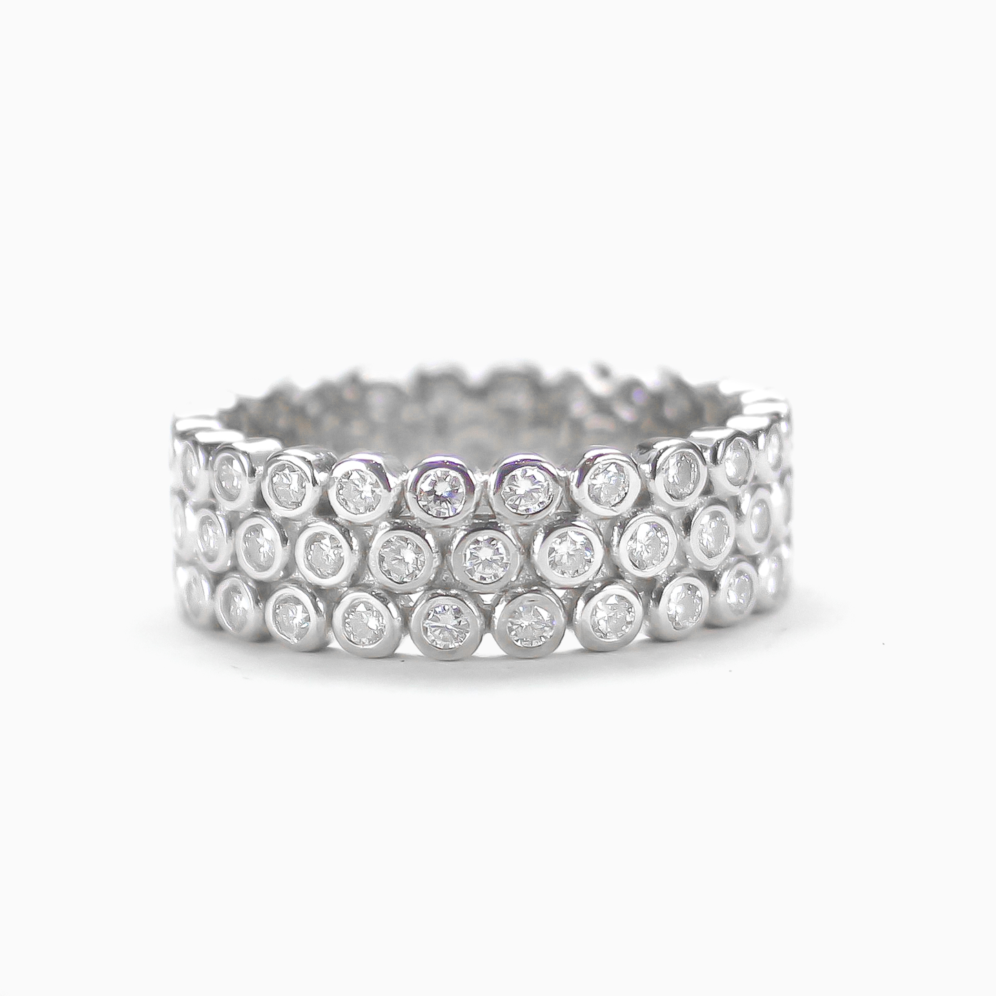 Flat front view of dome pavé moissanite ring in 18K gold plated sterling silver on clean white background