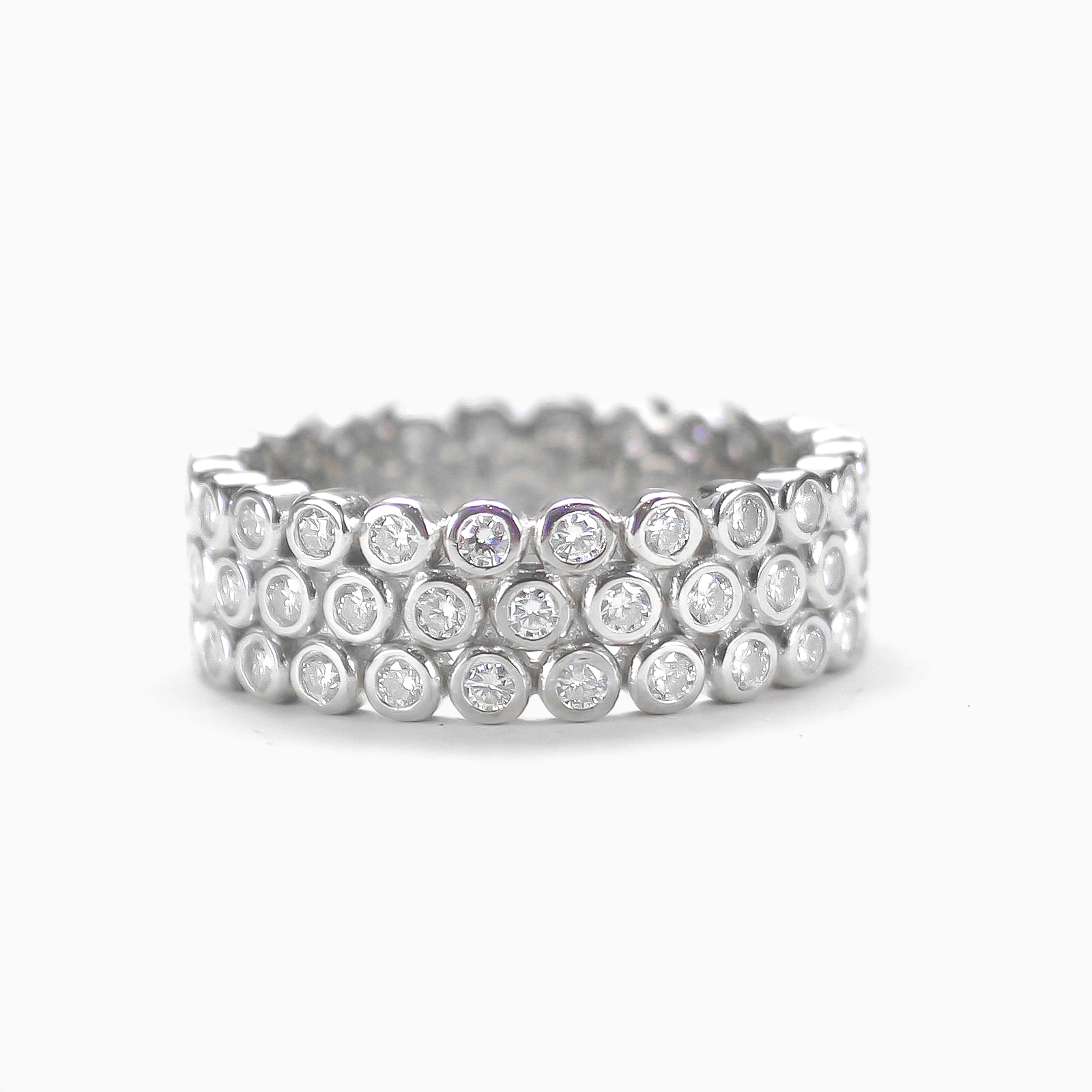 Flat front view of dome pavé moissanite ring in 18K gold plated sterling silver on clean white background