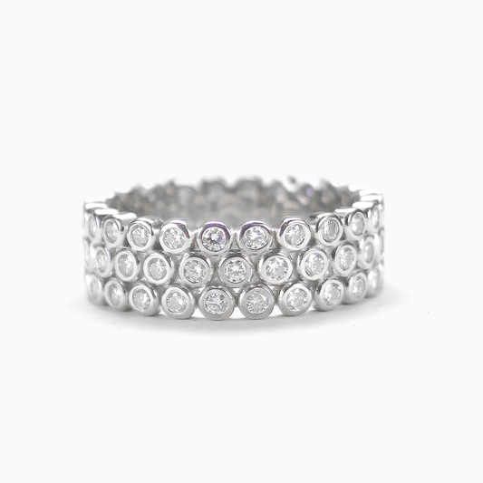 Flat front view of dome pavé moissanite ring in 18K gold plated sterling silver on clean white background