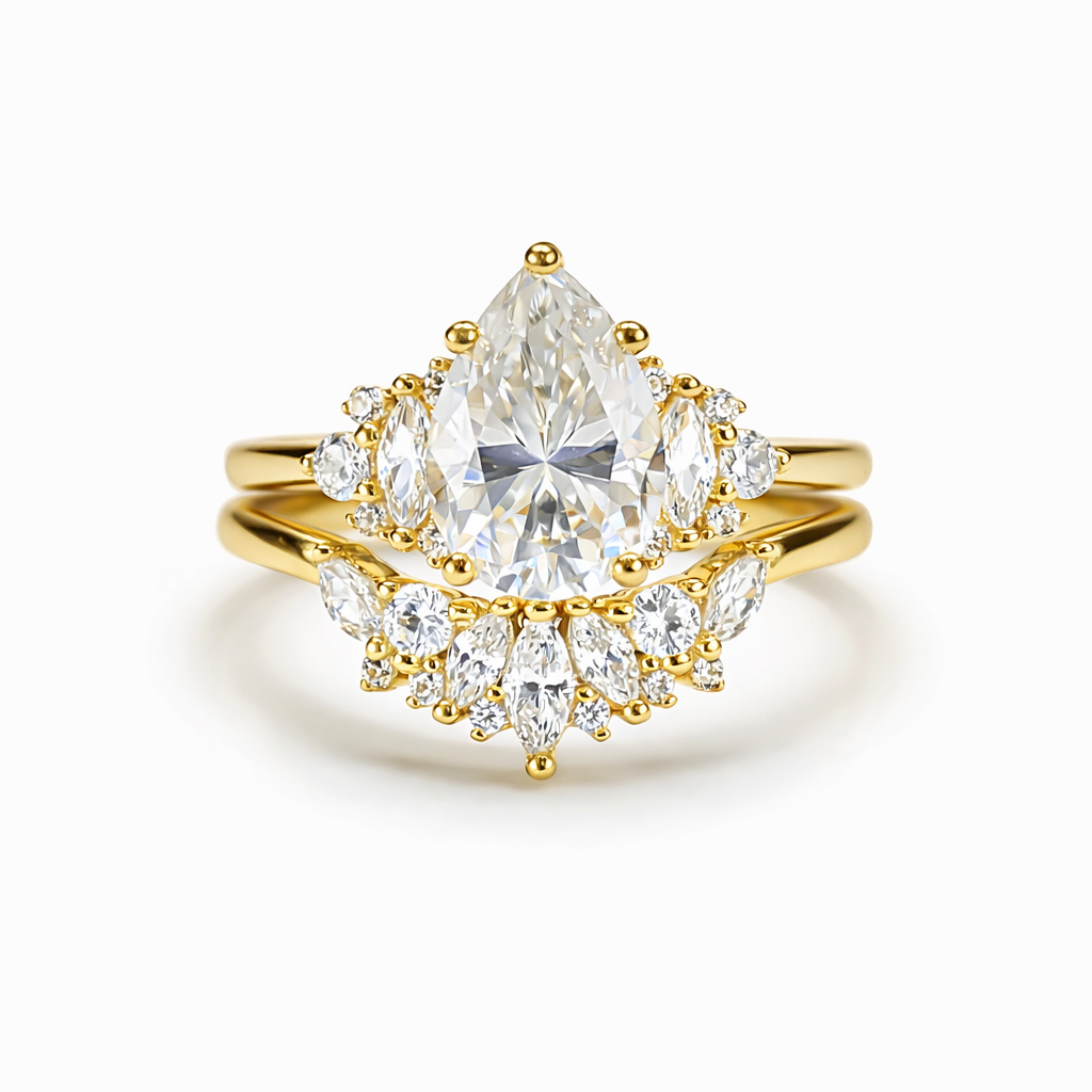 Front view of duo pear-cut moissanite ring set in 18K gold plated sterling silver on clean white background
