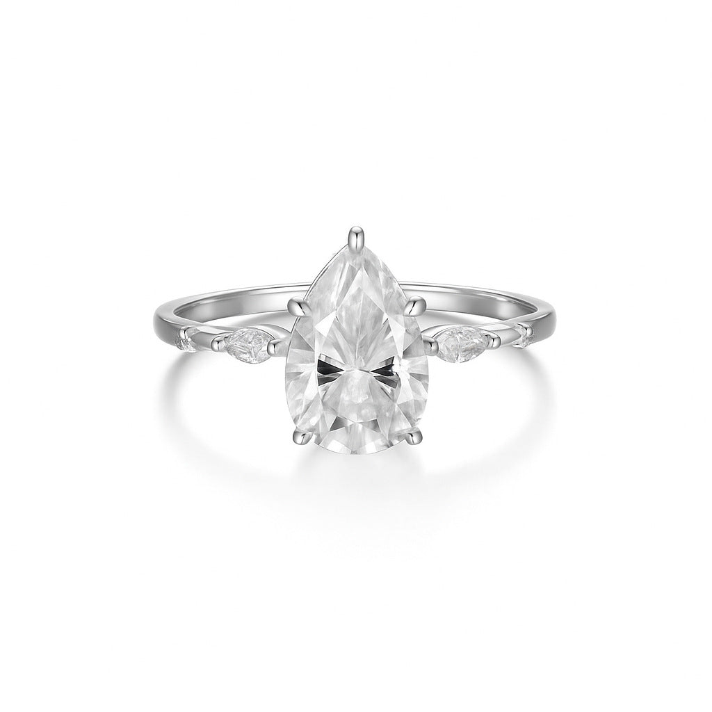 Elara pear moissanite ring in white gold plated sterling silver on white background-1
