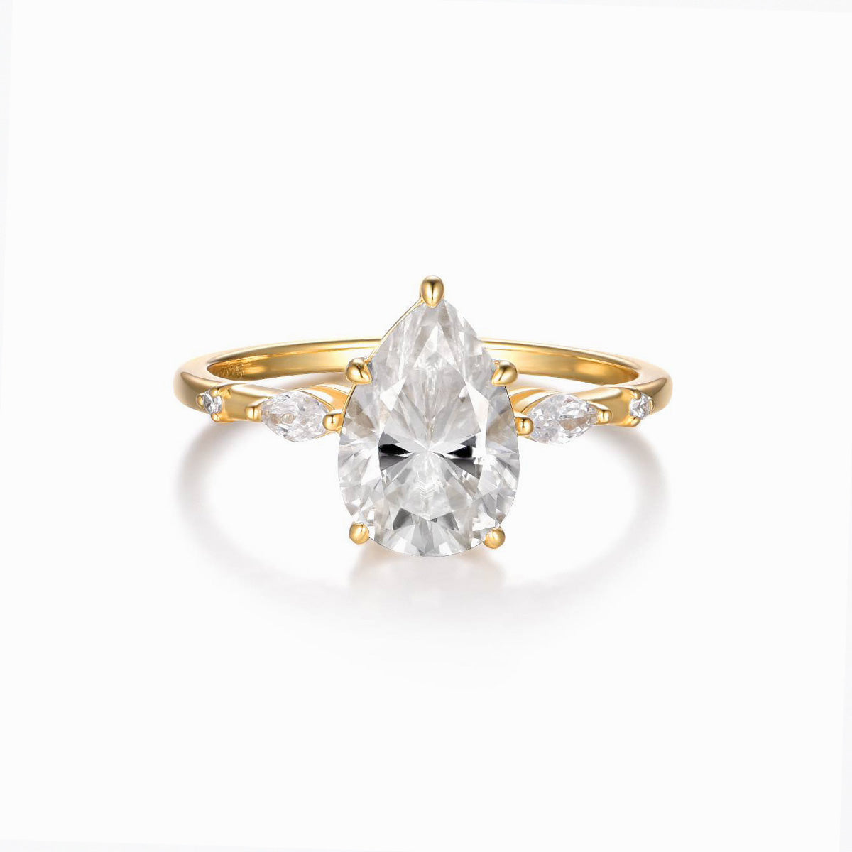 Elara pear moissanite ring in 18K gold plated sterling silver on white background