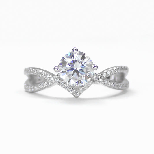 Elara twist solitaire crossover moissanite ring in 18K gold plated sterling silver, front view on white background