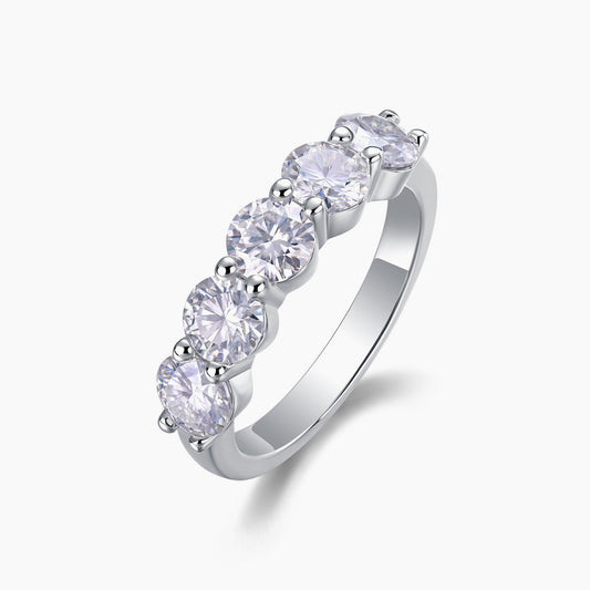 Front view of four-stone moissanite band ring in 18K gold plated sterling silver on clean white background