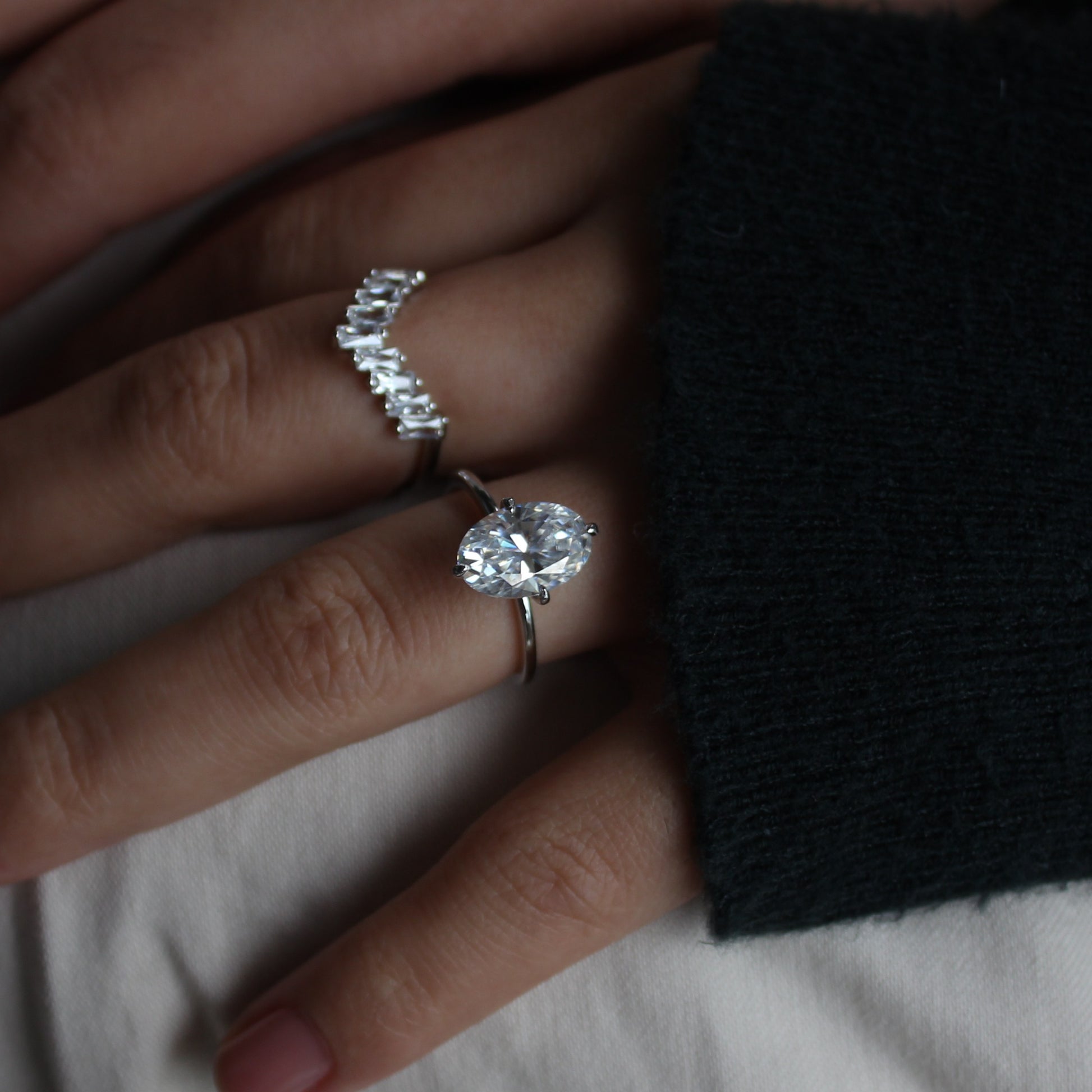 Moissanite cluster ring worn on hand, side detail