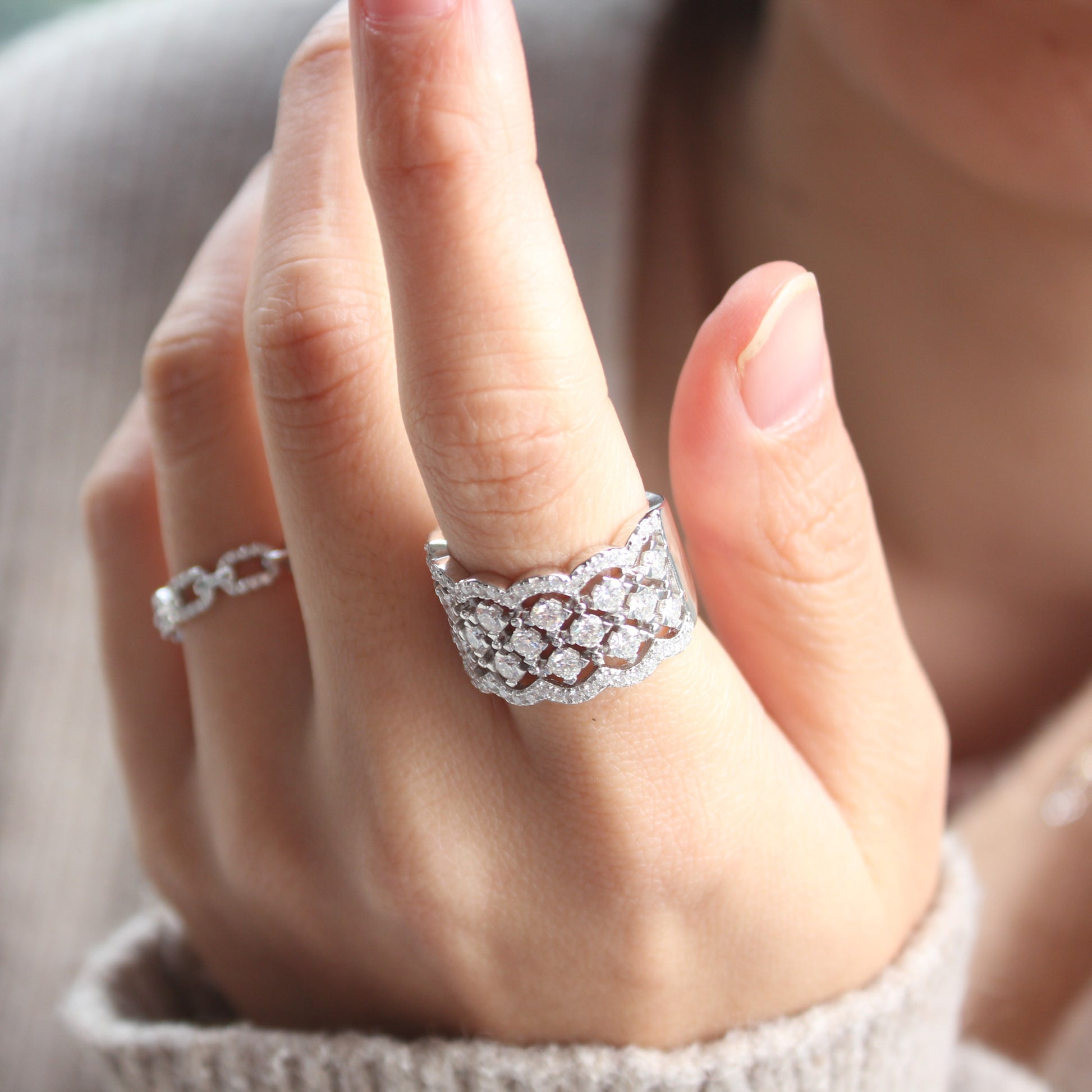 Lifestyle hand photo featuring Lattice pavé moissanite band