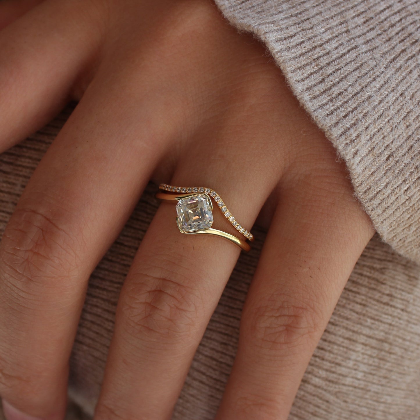 Liora moissanite ring set worn on hand, minimal styling