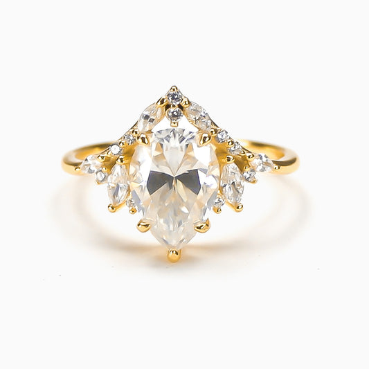 Liora pear floral cluster moissanite ring in 18K gold plated sterling silver on white background