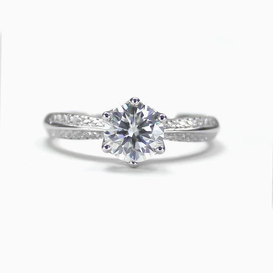 Front view of Liora round halo moissanite ring in 18K gold plated sterling silver on clean white background