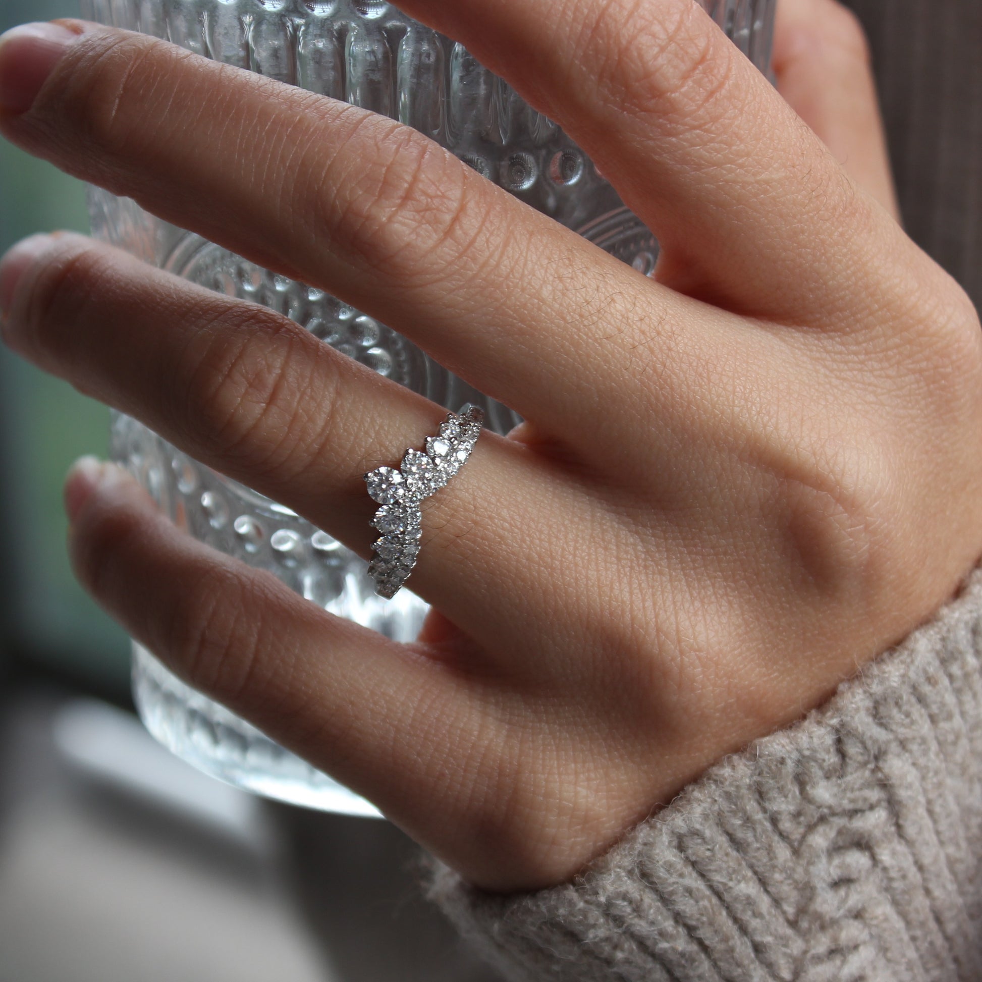 Moissanite curved band worn as statement stacking ring