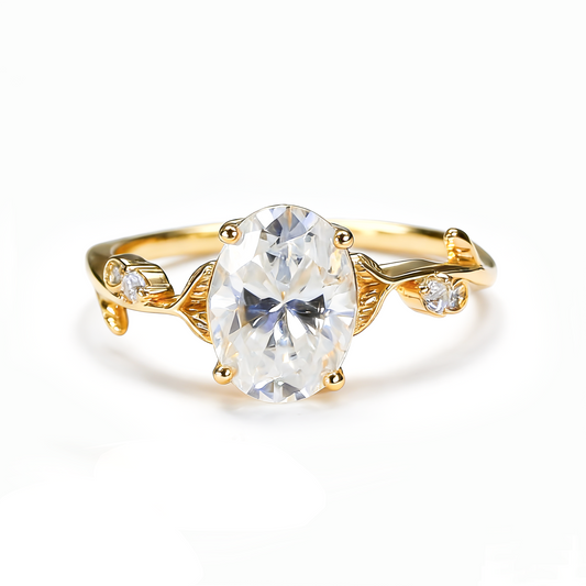 Oval moissanite leaf engagement ring in 18K gold plated sterling silver on white background