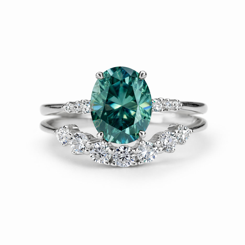 White gold tone oval moissanite statement ring set on clean white background