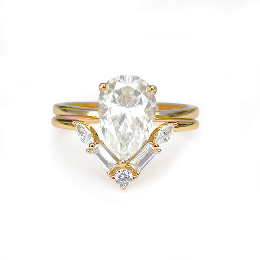 Pear moissanite duo enhancer bridal ring set in 18K gold plated sterling silver on white background