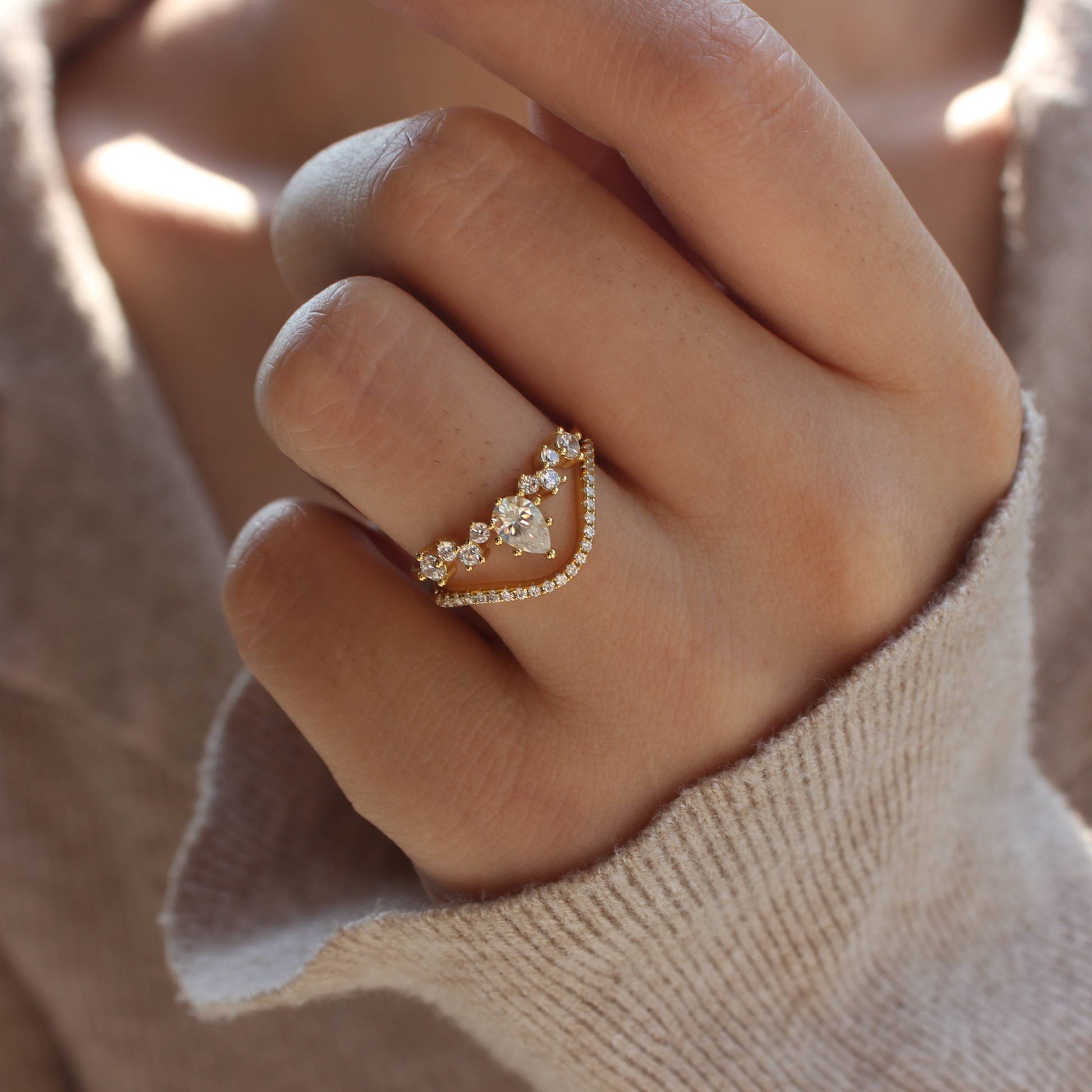 Petite Duo moissanite curved stacking rings worn on hand, front view