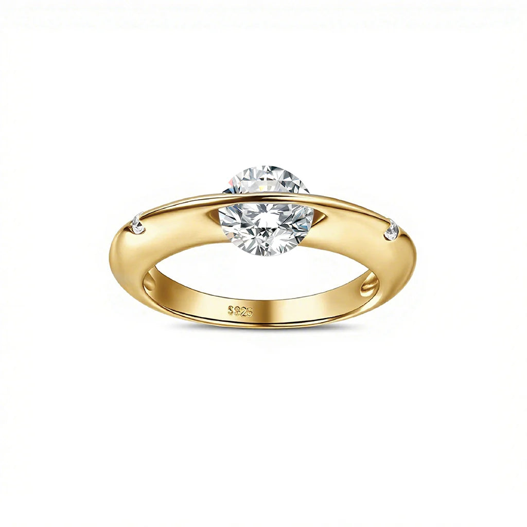 Stellar rotatable moissanite ring in gold tone, vertical front angled view